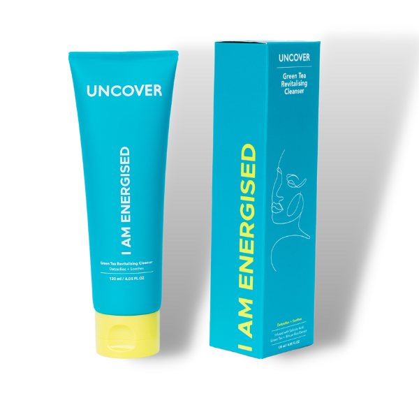 Uncover Green Tea Revitalizing Cleanser 120ml full size packaging and blue squeeze bottle with yellow cap at Bracketts Beauty